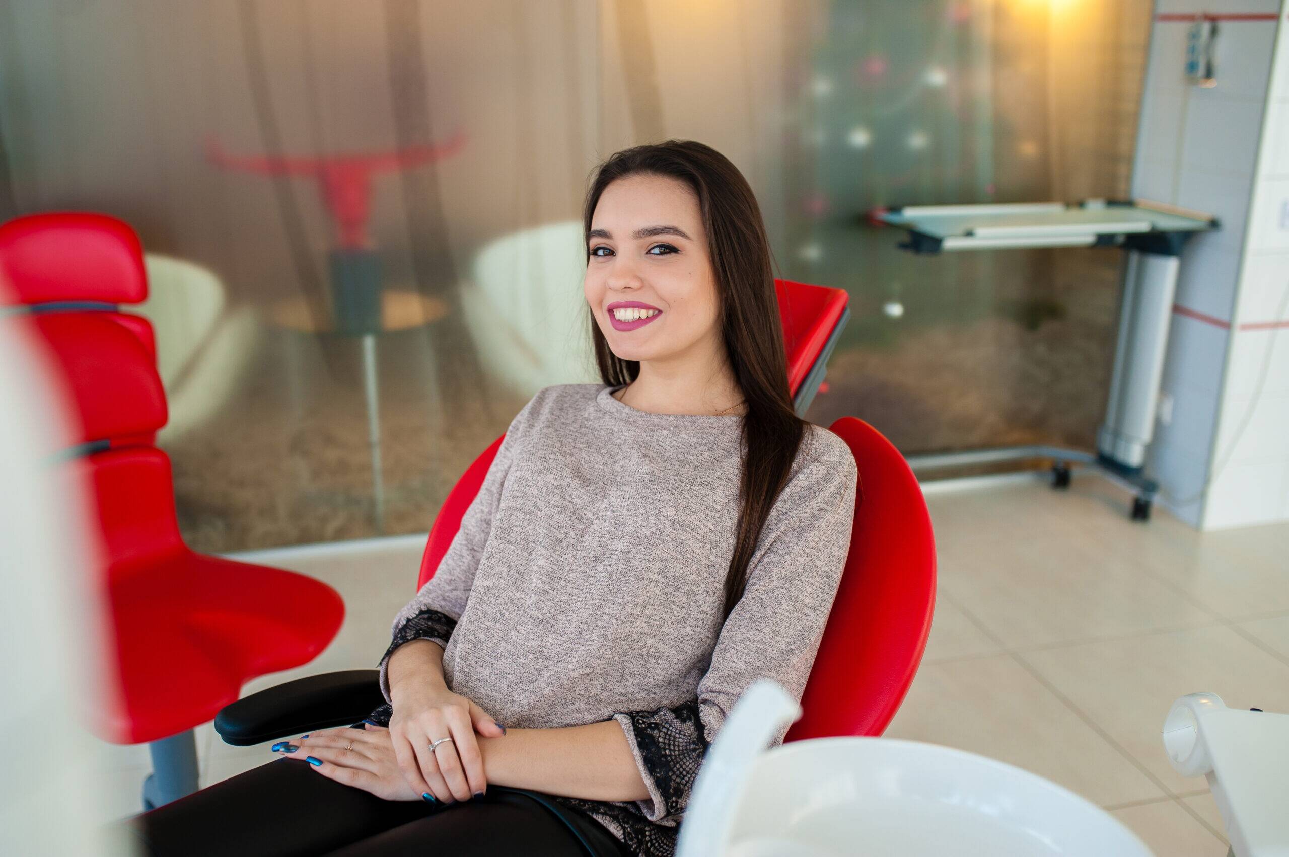 A girl seated in a dental chair